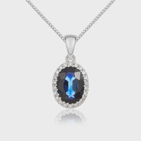 18ct White Gold Oval Sapphire &amp; Diamond Cluster Pendant