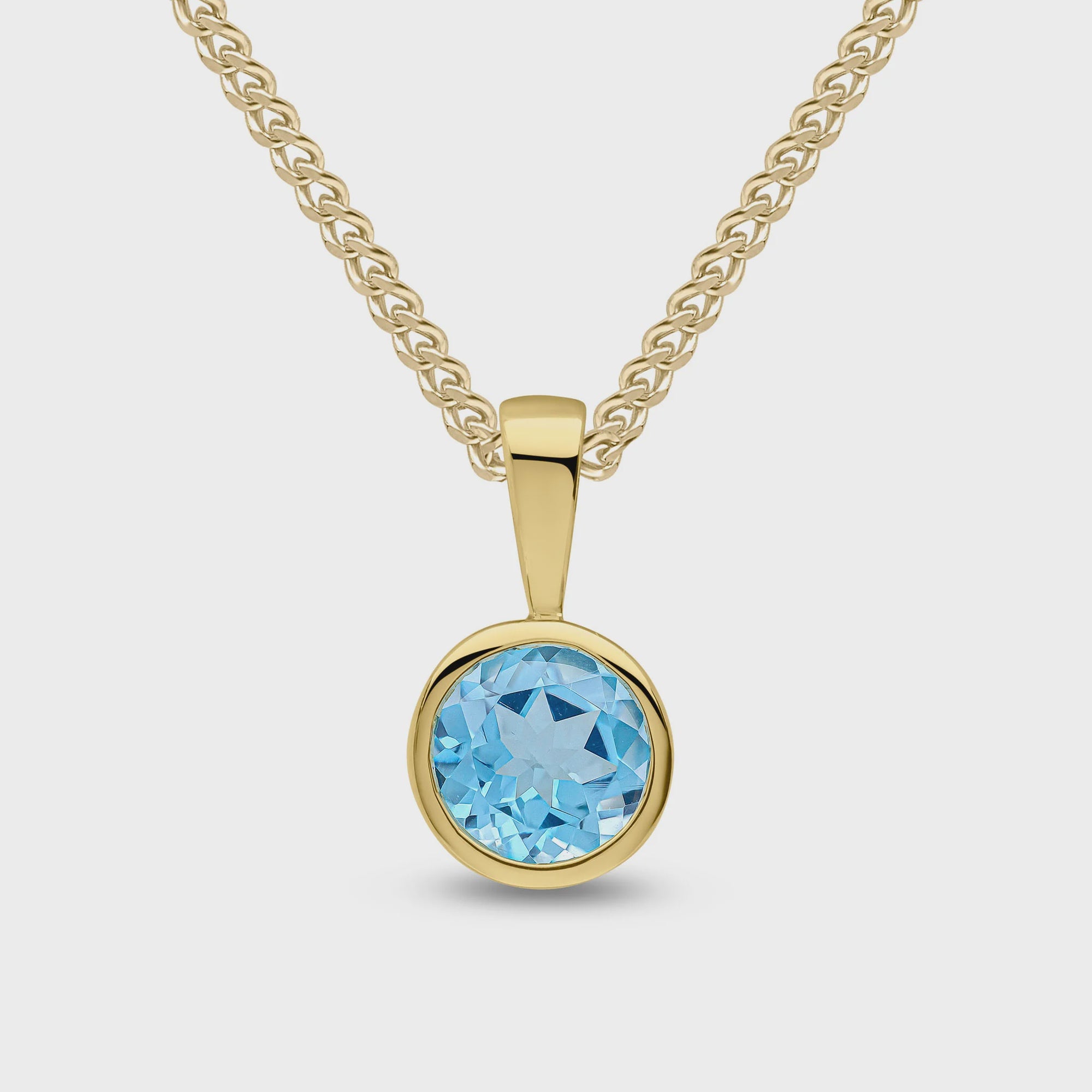 9ct Yellow Gold 0.96ct Round Swiss Blue Topaz Rubover Pendant