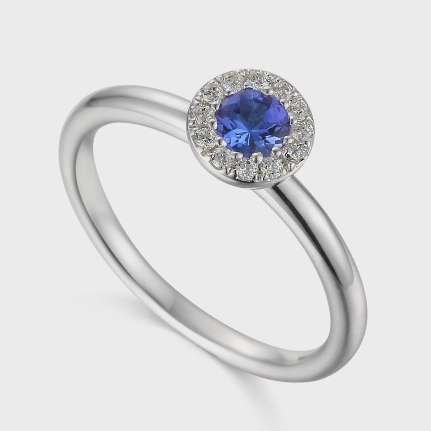 9ct White Gold Tanzanite 23pt &amp; Diamond 10pt Halo Ring