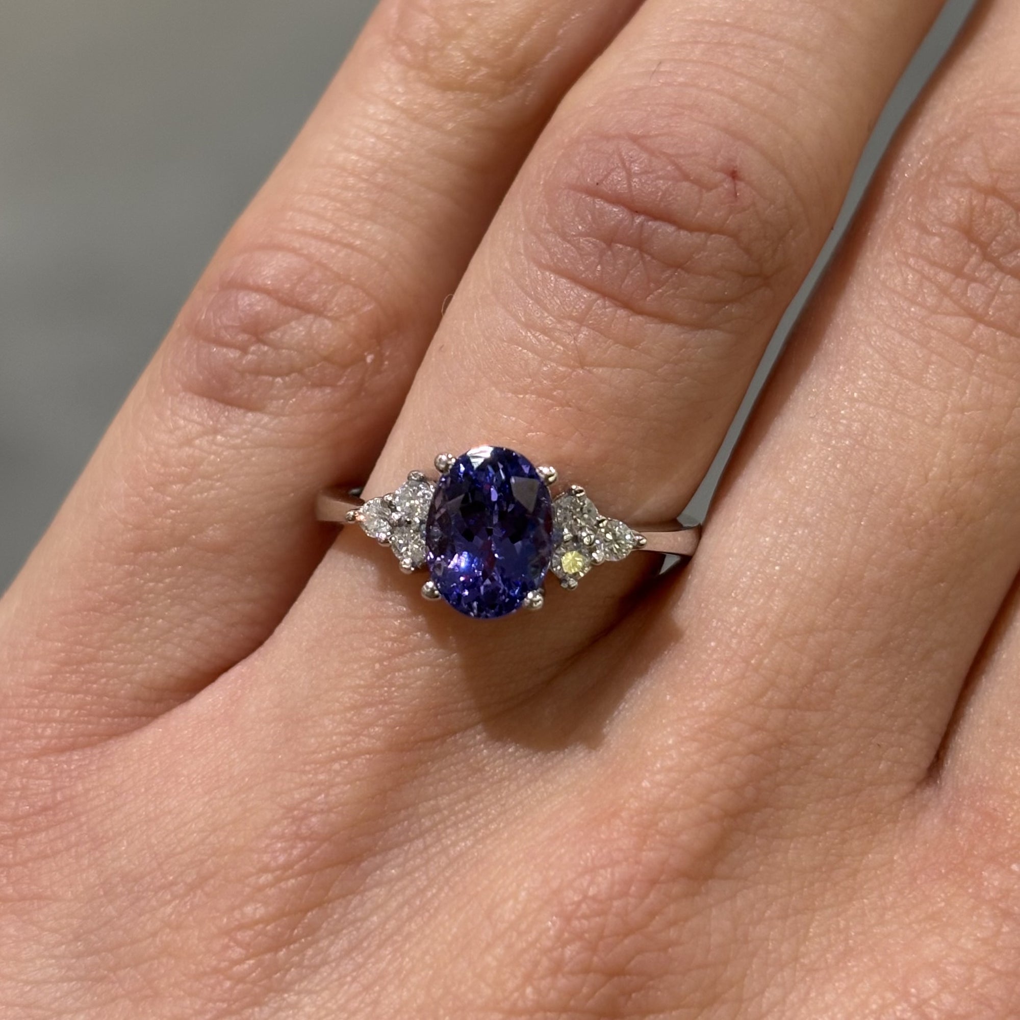 Pre-Owned 18ct White Gold 1.54ct Oval Tanzanite &amp; Diamond Cluster Ring