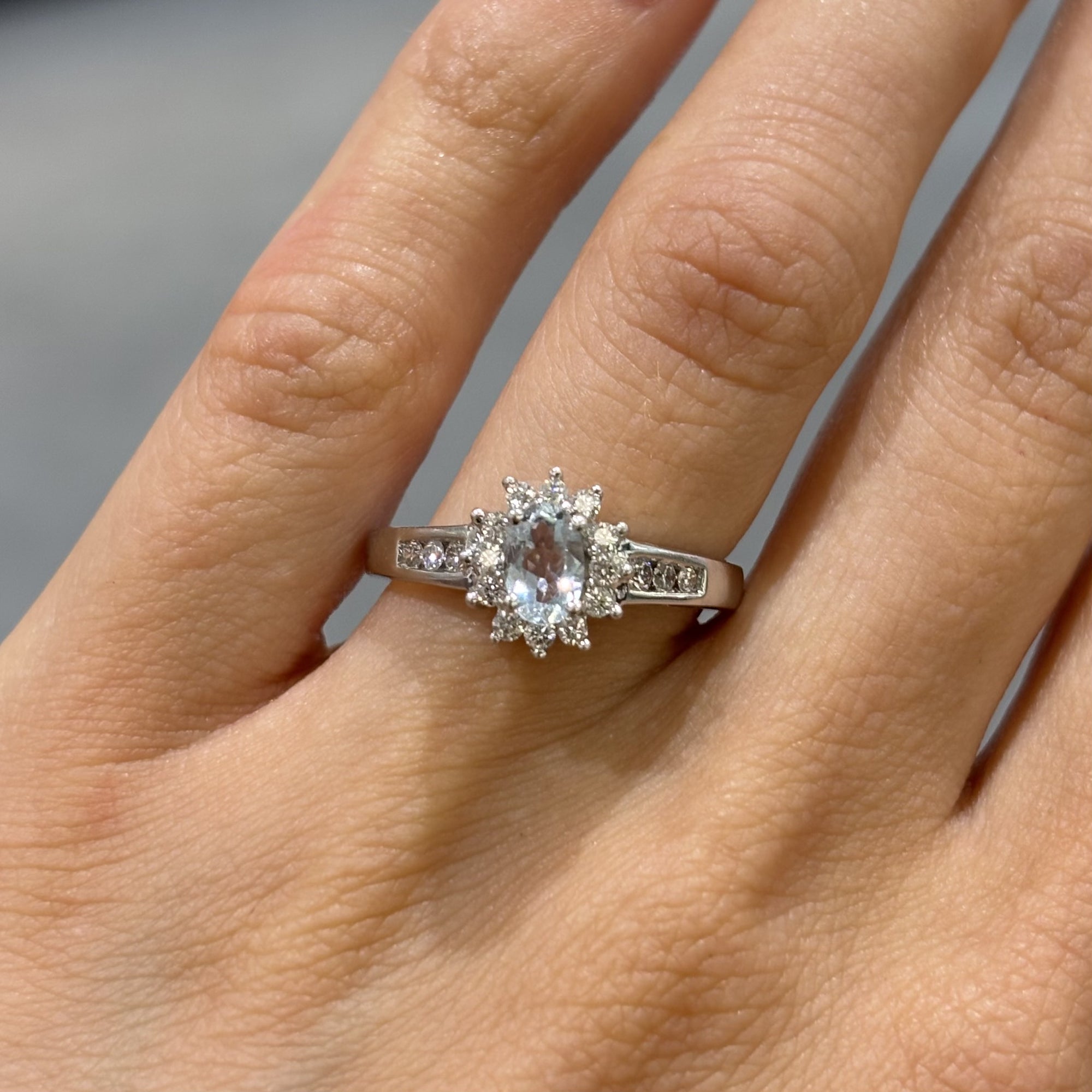 Pre-Owned 18ct White Gold 0.37ct Oval Aquamarine &amp; 0.30ct Diamond Cluster Ring