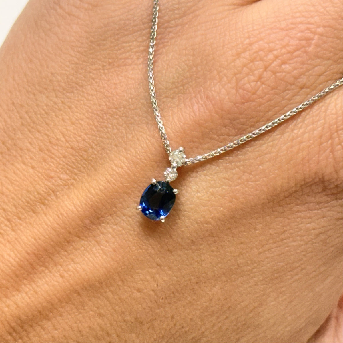 Pre-Owned Platinum 0.77ct Sapphire &amp; 0.10ct Diamond Pendant