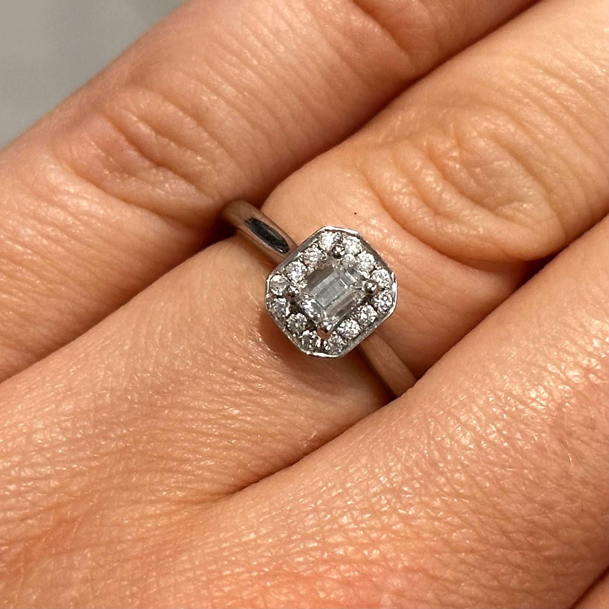 Pre-Owned Platinum Emerald Cut Diamond Halo Ring 0.50ct F Si1