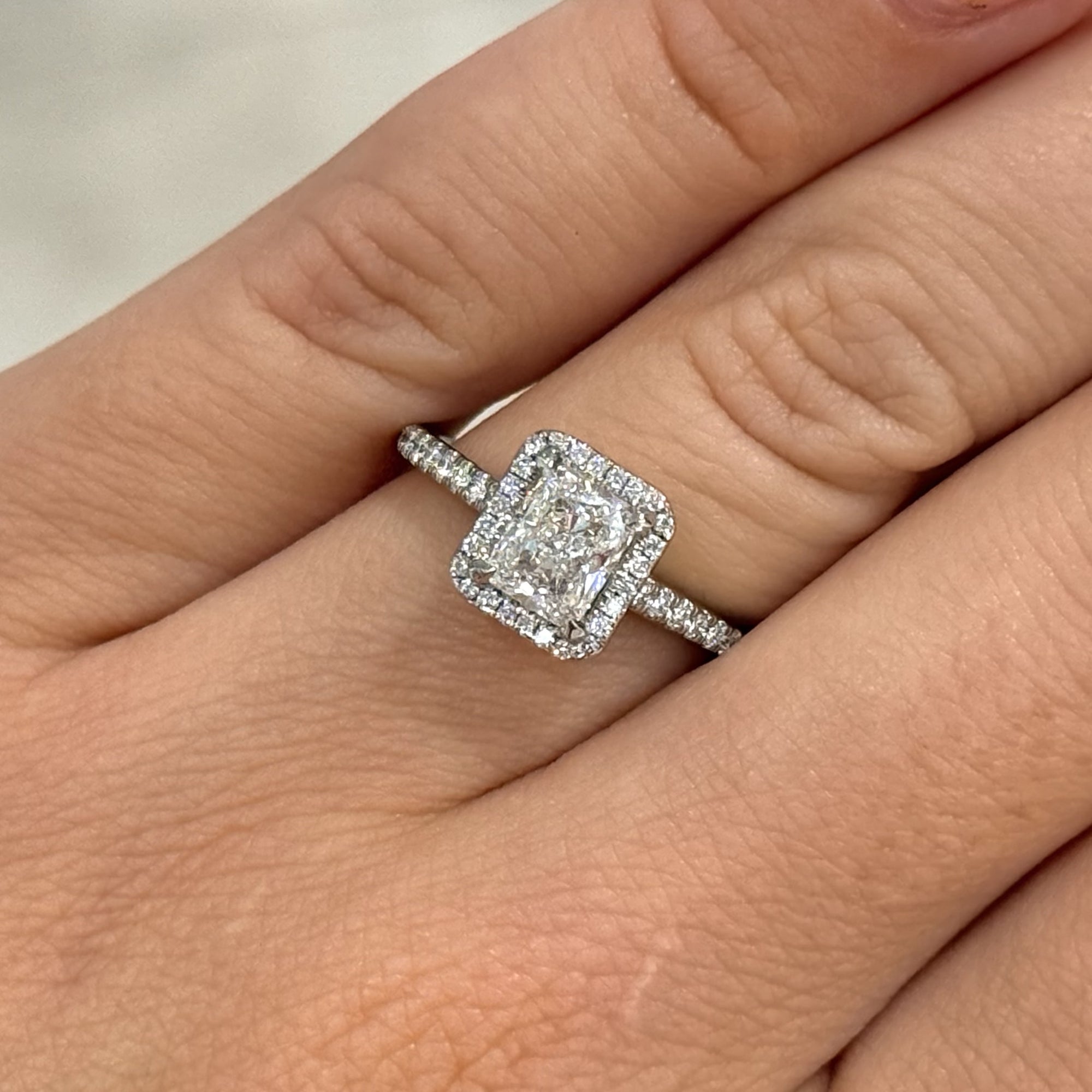 Pre-Owned Platinum 1.01ct Radiant Cut Diamond with Diamond Halo