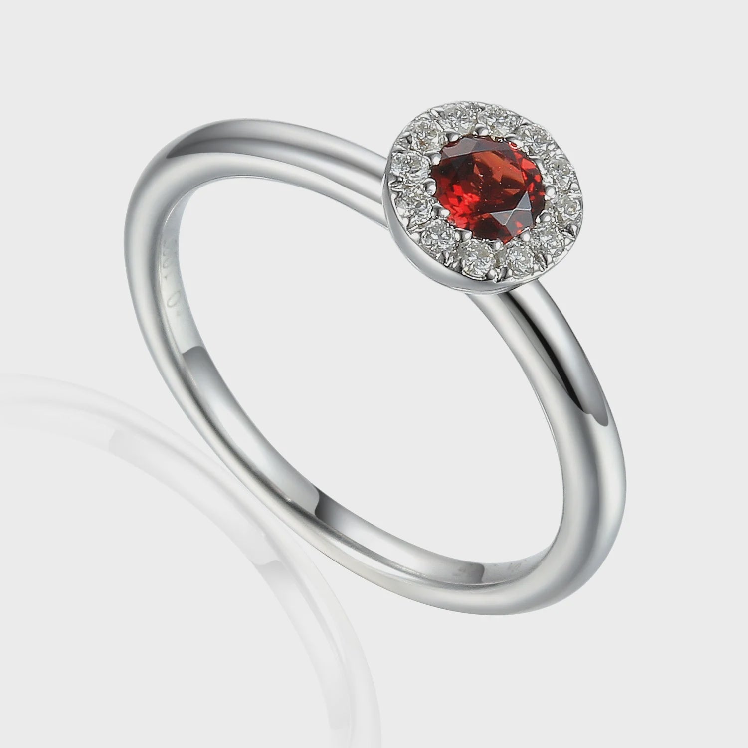 9ct White Gold 0.28ct Garnet &amp; 0.10ct Diamond Halo Ring